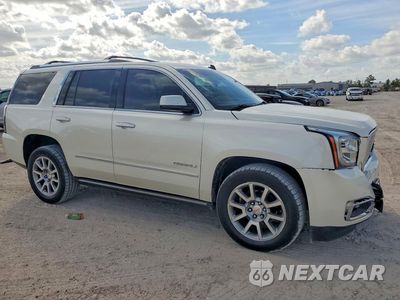 Czwarte zdjęcie samochodu z boku: 2015 GMC YUKON DENALI VIN:1GKS2CKJ9FR144360 - miniatura