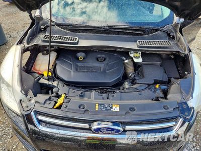 Zdjęcie 12 z 13 samochodu: 2014 FORD ESCAPE TITANIUM VIN:1FMCU0J90EUE40827 - miniatura