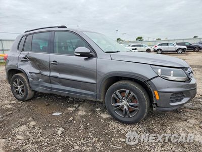 Czwarte zdjęcie samochodu z boku: 2014 VOLKSWAGEN TIGUAN S VIN:WVGBV3AX5EW624643 - miniatura