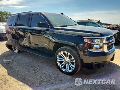 Czwarte zdjęcie samochodu z boku: 2019 CHEVROLET TAHOE K1500 LT VIN:1GNSKBKC4KR333233 - miniatura
