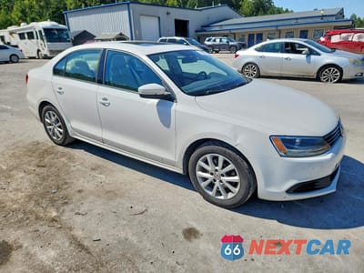 Czwarte zdjęcie samochodu z boku: 2012 VOLKSWAGEN JETTA SE VIN:3VWDP7AJ7CM424383 - miniatura