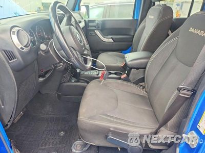 Zdjęcie 7 z 13 samochodu: 2016 JEEP WRANGLER UNLIMITED SAHARA VIN:1C4BJWEG6GL161721 - miniatura