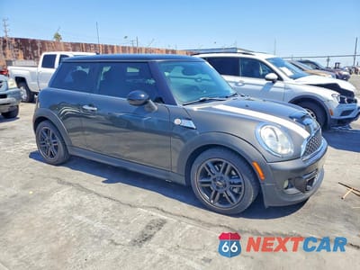 Czwarte zdjęcie samochodu z boku: 2011 MINI COOPER S VIN:WMWSV3C57BTY15040 - miniatura