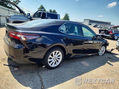 Trzecie zdjęcie samochodu z tyłu: 2021 TOYOTA CAMRY LE VIN:4T1R11AKXMU614798 - miniatura