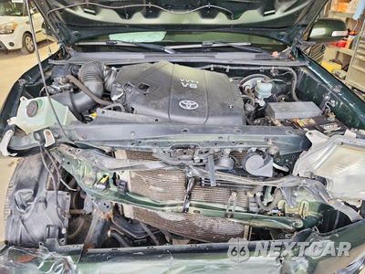 Zdjęcie 11 z 12 samochodu: 2012 TOYOTA TACOMA V6 VIN:5TFLU4EN3CX034281 - miniatura