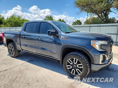 Czwarte zdjęcie samochodu z boku: 2020 GMC SIERRA K1500 AT4 VIN:3GTP9EEL2LG408911 - miniatura