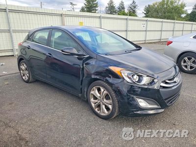 Czwarte zdjęcie samochodu z boku: 2014 HYUNDAI ELANTRA GT BASE VIN:KMHD35LH1EU167096 - miniatura