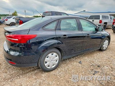 Trzecie zdjęcie samochodu z tyłu: 2018 FORD FOCUS S VIN:1FADP3E27JL243688 - miniatura