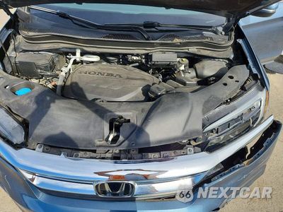 Zdjęcie 12 z 13 samochodu: 2021 HONDA PILOT EXL VIN:5FNYF6H57MB103119 - miniatura