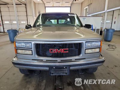 Piąte zdjęcie samochodu w środku: 1999 GMC SUBURBAN K2500 VIN:3GKGK26J5XG527661 - miniatura