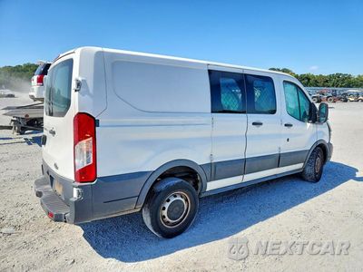 Trzecie zdjęcie samochodu z tyłu: 2018 FORD TRANSIT T-150 DELIVERY VAN VIN:1FTYE1ZM8JKB39850 - miniatura