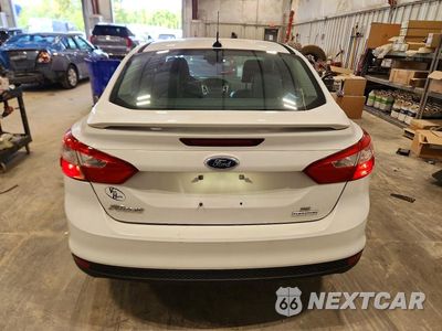 Zdjęcie 6 z 12 samochodu: 2014 FORD FOCUS SE VIN:1FADP3F20EL104278 - miniatura