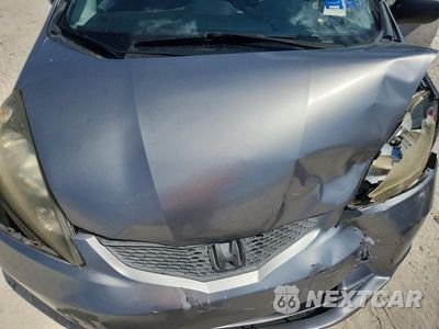 Zdjęcie 11 z 12 samochodu: 2009 HONDA FIT VIN:JHMGE88299C002179 - miniatura