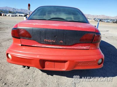 Zdjęcie 6 z 12 samochodu: 2000 PONTIAC SUNFIRE SE VIN:1G2JB5243Y7414182 - miniatura