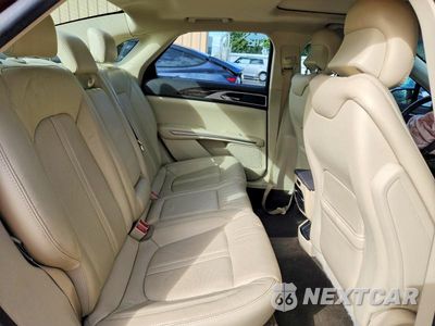 Zdjęcie 10 z 12 samochodu: 2015 LINCOLN MKZ HYBRID VIN:3LN6L2LUXFR600945 - miniatura