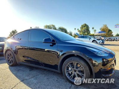 Czwarte zdjęcie samochodu z boku: 2025 TESLA MODEL Y VIN:7SAYGDED2SF277645 - miniatura