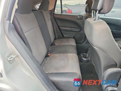 Zdjęcie 10 z 12 samochodu: 2011 DODGE CALIBER MAINSTREET VIN:1B3CB3HA4BD107121 - miniatura