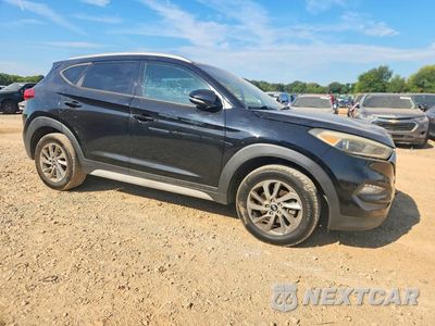 Czwarte zdjęcie samochodu z boku: 2017 HYUNDAI TUCSON SE PLUS VIN:KM8J33A43HU444682 - miniatura