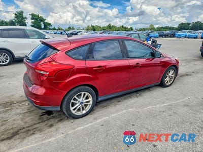 Trzecie zdjęcie samochodu z tyłu: 2016 FORD FOCUS SE VIN:1FADP3K24GL209673 - miniatura