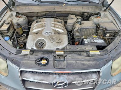 Zdjęcie 12 z 14 samochodu: 2007 HYUNDAI SANTA FE SE VIN:5NMSH73E37H040245 - miniatura