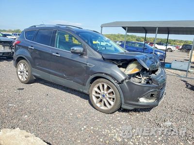 Czwarte zdjęcie samochodu z boku: 2015 FORD ESCAPE SE VIN:1FMCU9GXXFUB17817 - miniatura