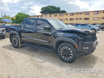 Czwarte zdjęcie samochodu z boku: 2022 NISSAN FRONTIER PRO-X VIN:1N6ED1EJ9NN676357 - miniatura