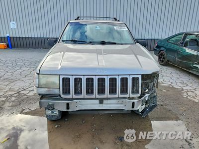 Piąte zdjęcie samochodu w środku: 1997 JEEP GRAND CHEROKEE LAREDO VIN:1J4GZ58Y7VC711433 - miniatura