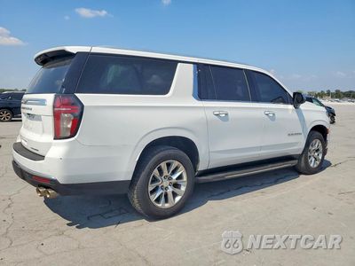 Trzecie zdjęcie samochodu z tyłu: 2021 CHEVROLET SUBURBAN K1500 PREMIER VIN:1GNSKFKD5MR218787 - miniatura