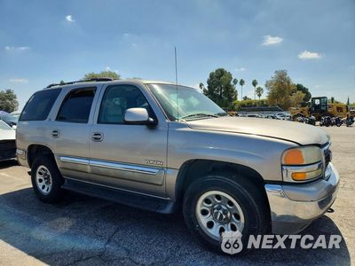 Czwarte zdjęcie samochodu z boku: 2001 GMC YUKON VIN:1GKEC13T81R210145 - miniatura
