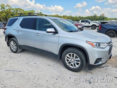 Czwarte zdjęcie samochodu z boku: 2019 CHEVROLET TRAVERSE LT VIN:1GNERGKW2KJ104516 - miniatura