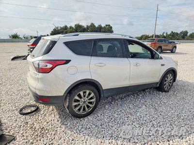Trzecie zdjęcie samochodu z tyłu: 2017 FORD ESCAPE TITANIUM VIN:1FMCU9JD8HUC90110 - miniatura