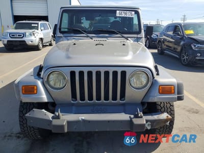 Piąte zdjęcie samochodu w środku: 2001 JEEP WRANGLER / TJ SPORT VIN:1J4FA49S11P375255 - miniatura