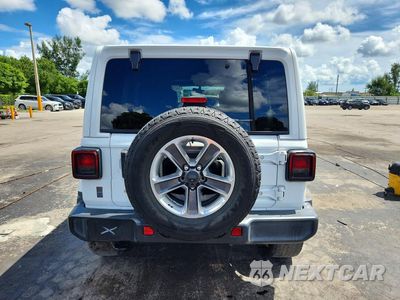 Zdjęcie 6 z 13 samochodu: 2019 JEEP WRANGLER UNLIMITED SAHARA VIN:1C4HJXEG8KW531087 - miniatura