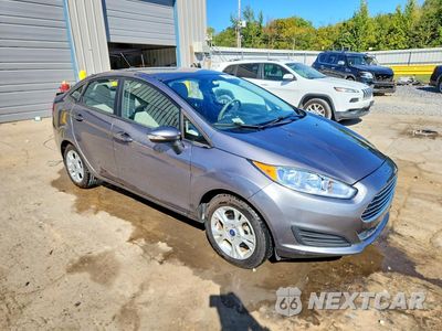 Czwarte zdjęcie samochodu z boku: 2014 FORD FIESTA SE VIN:3FADP4BJ9EM211122 - miniatura