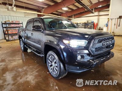 Czwarte zdjęcie samochodu z boku: 2021 TOYOTA TACOMA LIMITED VIN:3TMGZ5AN8MM431040 - miniatura