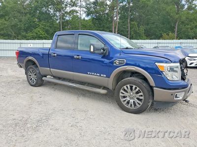 Czwarte zdjęcie samochodu z boku: 2016 NISSAN TITAN XD PLATINUM RESERVE VIN:1N6BA1F27GN512529 - miniatura