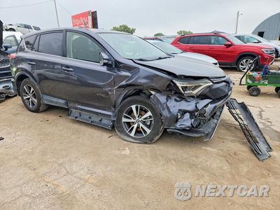 Czwarte zdjęcie samochodu z boku: 2018 TOYOTA RAV4 XLE VIN:JTMWFREV4JJ173842 - miniatura