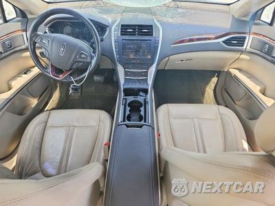 Zdjęcie 8 z 12 samochodu: 2016 LINCOLN MKZ VIN:3LN6L2GK8GR613493 - miniatura
