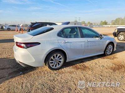 Trzecie zdjęcie samochodu z tyłu: 2022 TOYOTA CAMRY LE VIN:4T1C11AK3NU028886 - miniatura