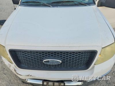 Zdjęcie 11 z 12 samochodu: 2005 FORD F150 VIN:1FTRF12W95NB61602 - miniatura