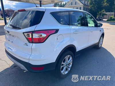 Czwarte zdjęcie samochodu z boku: 2017 FORD ESCAPE SE VIN:1FMCU9GD8HUC04625 - miniatura