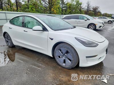 Czwarte zdjęcie samochodu z boku: 2023 TESLA MODEL 3 VIN:5YJ3E1EAXPF422620 - miniatura