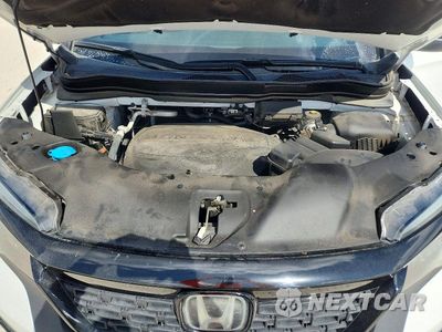 Zdjęcie 12 z 13 samochodu: 2021 HONDA PASSPORT EXL VIN:5FNYF7H51MB015902 - miniatura