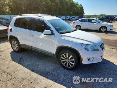Czwarte zdjęcie samochodu z boku: 2011 VOLKSWAGEN TIGUAN S VIN:WVGAV7AX0BW541197 - miniatura