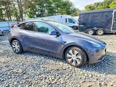 Czwarte zdjęcie samochodu z boku: 2023 TESLA MODEL Y VIN:7SAYGAEE4PF844193 - miniatura