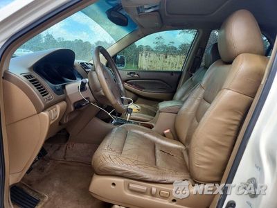 Zdjęcie 7 z 13 samochodu: 2004 ACURA MDX TOURING VIN:2HNYD18694H538729 - miniatura