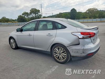 Drugie zdjęcie samochodu z przodu: 2017 FORD FOCUS TITANIUM VIN:1FADP3J21HL280011 - miniatura