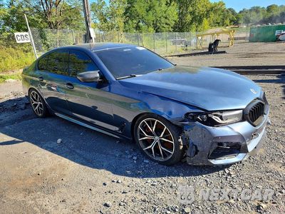 Czwarte zdjęcie samochodu z boku: 2023 BMW M550XI VIN:WBA13BK03PCM16571 - miniatura