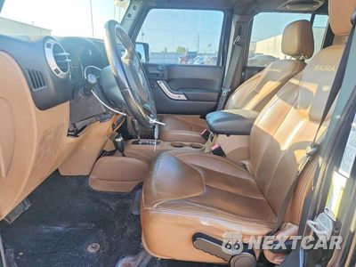 Zdjęcie 7 z 12 samochodu: 2014 JEEP WRANGLER UNLIMITED SAHARA VIN:1C4HJWEG6EL109741 - miniatura