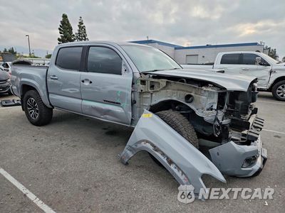 Czwarte zdjęcie samochodu z boku: 2021 TOYOTA TACOMA TRD SPORT VIN:5TFAZ5CNXMX111117 - miniatura